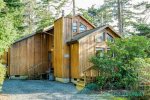Side entrance into this gorgeous wooden beach cabin that`s only a 4 blocks from the beach and downtown Manzanita.